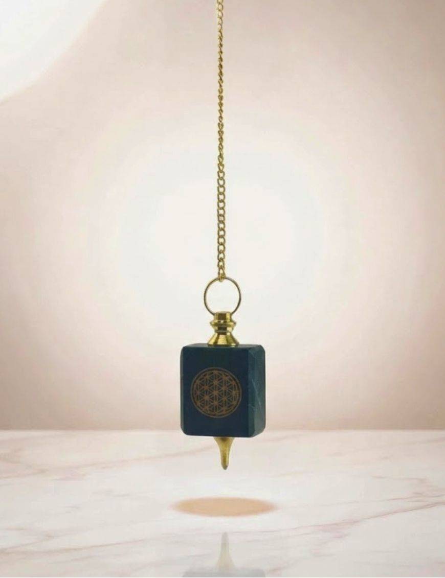 Pendule Fleur de Vie noir et doré : harmonie & intuition